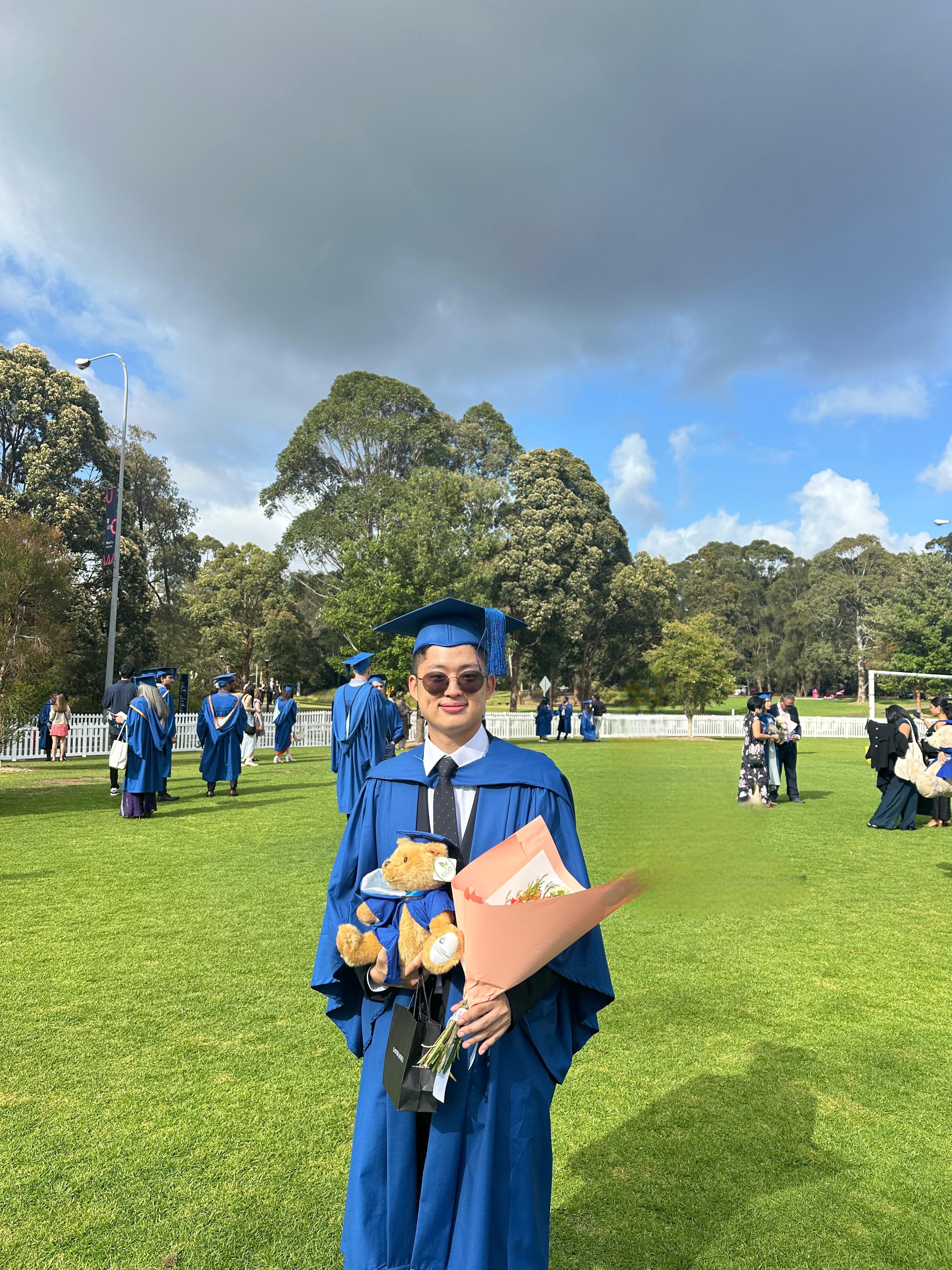 Korean teacher Jacob in graduation attire with 3+ years teaching experience in Sydney